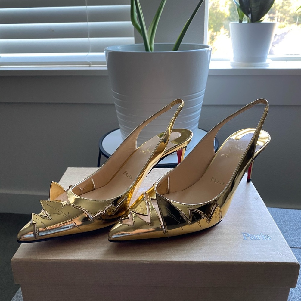 Brand new and authentic Christian Louboutin shoe